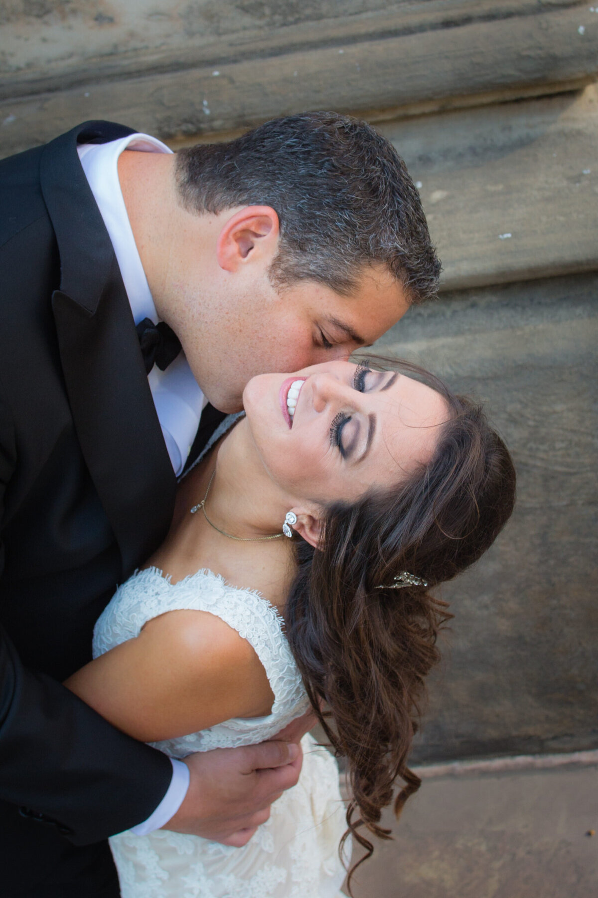 bride and groom kissing