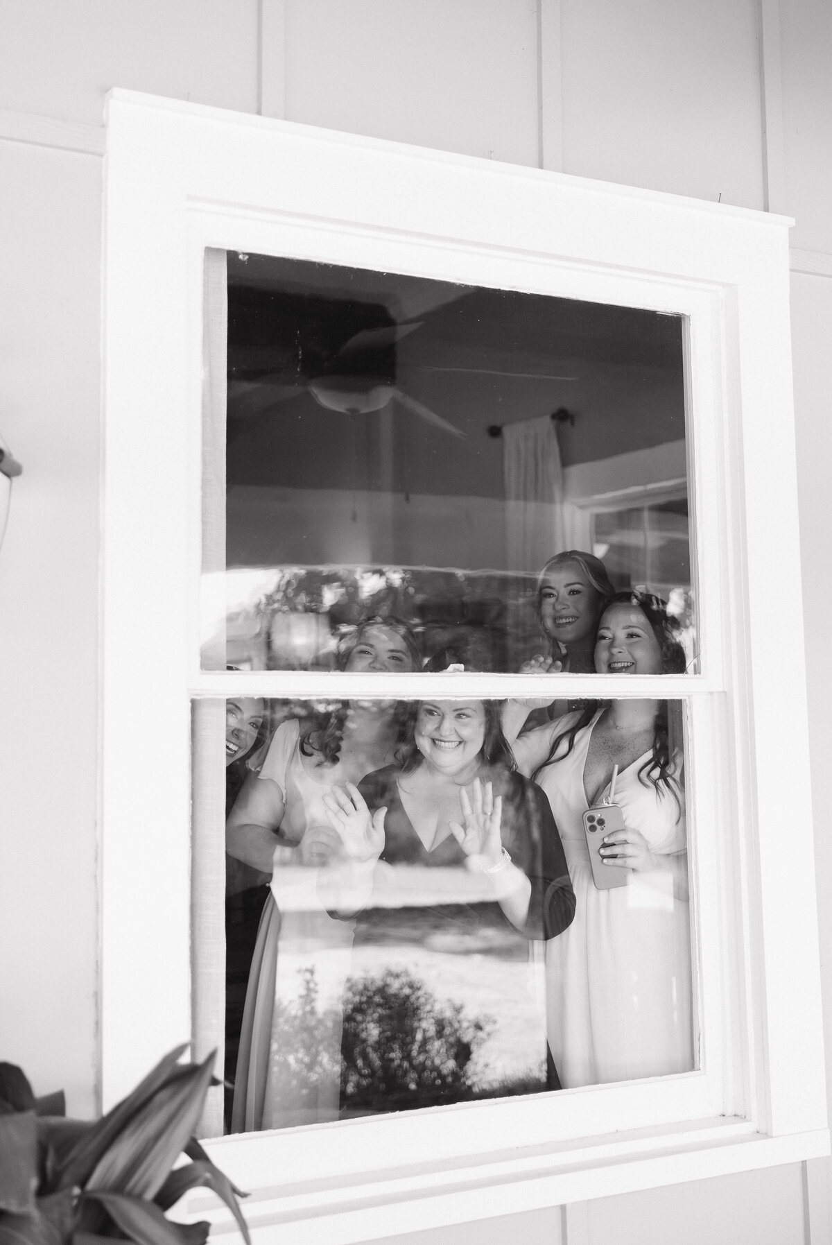 friends and family candid watching first look