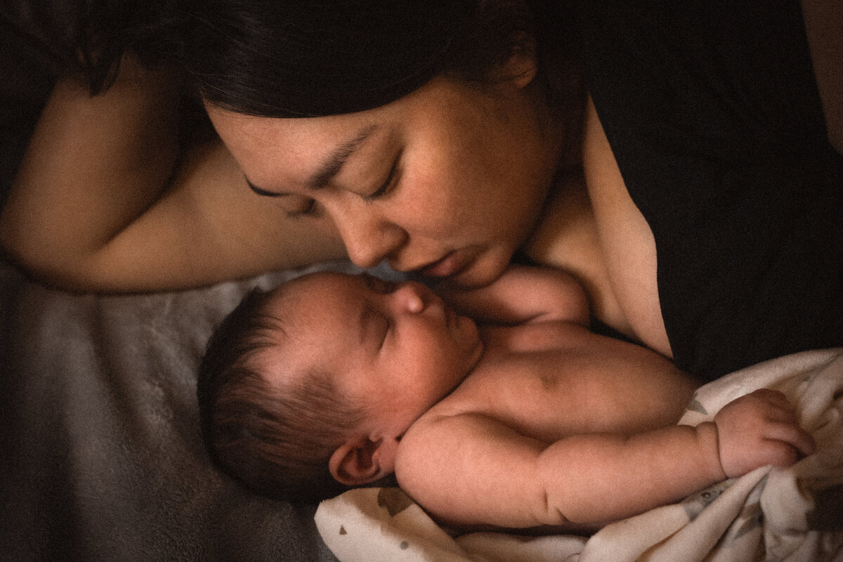 mother loving newborn baby