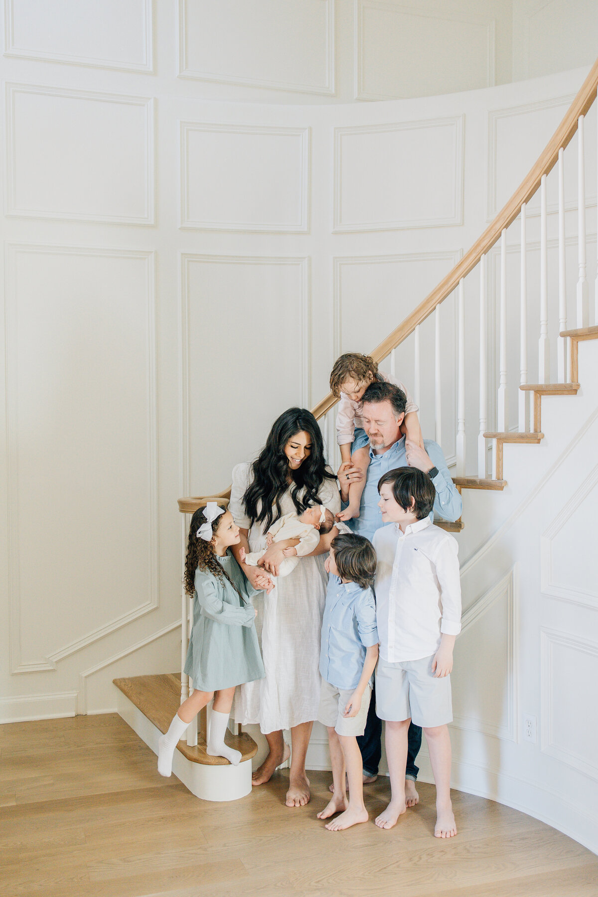 In-home lifestyle newborn session  with family of seven located in Flower Mound, TX