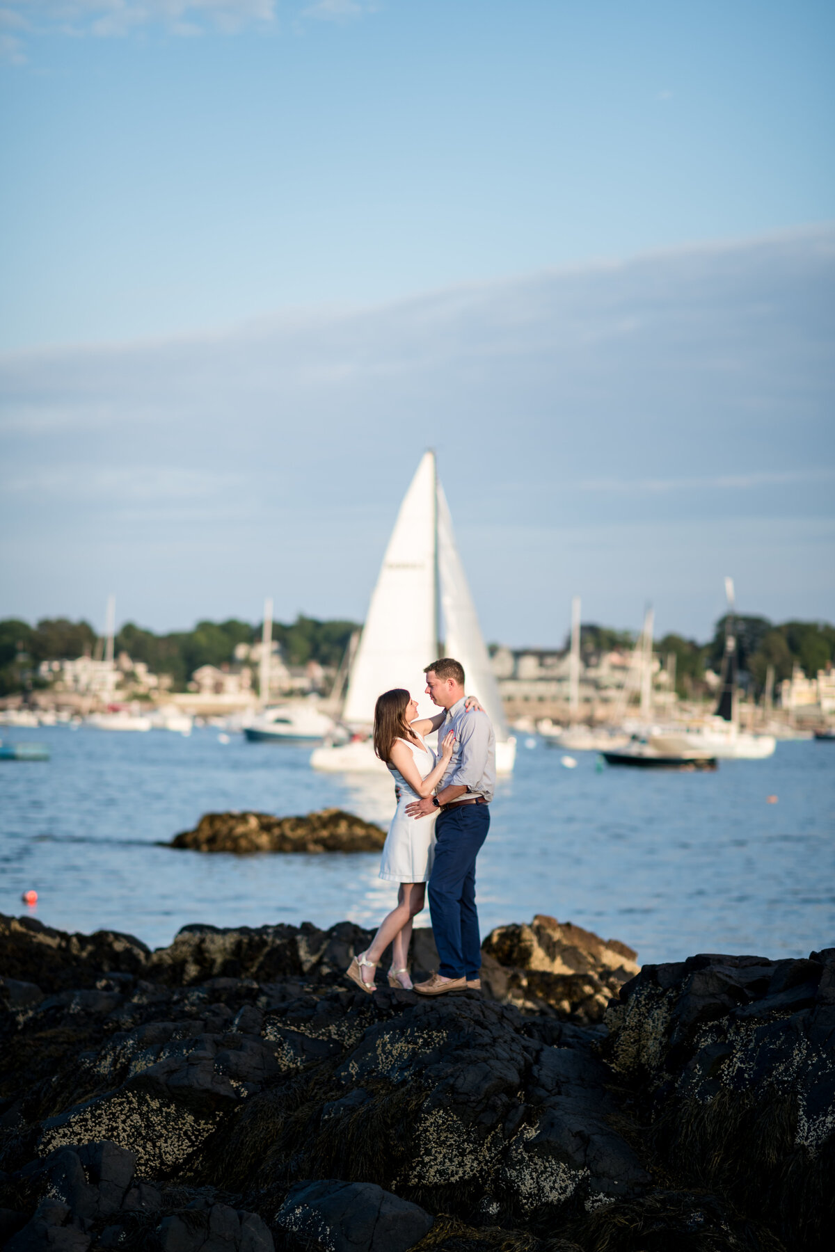 sailboat engagement session by the seashore