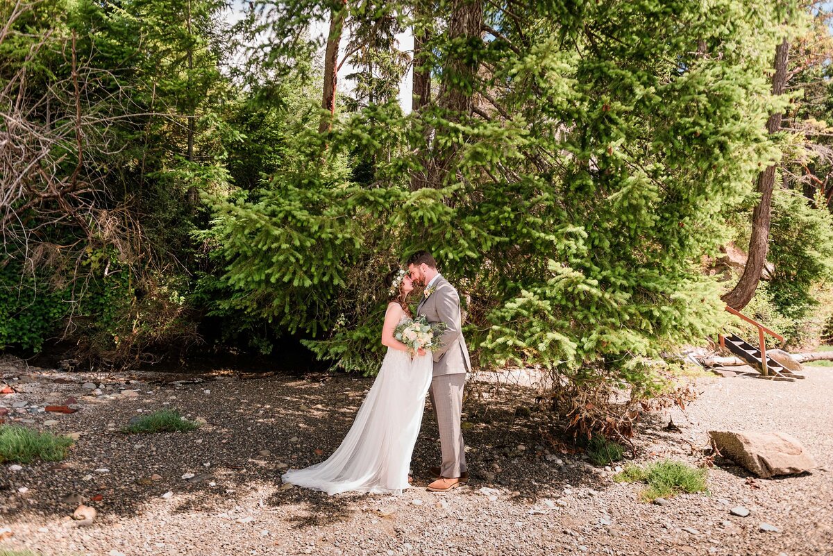 Bride and groom on the beach on bainbridge island