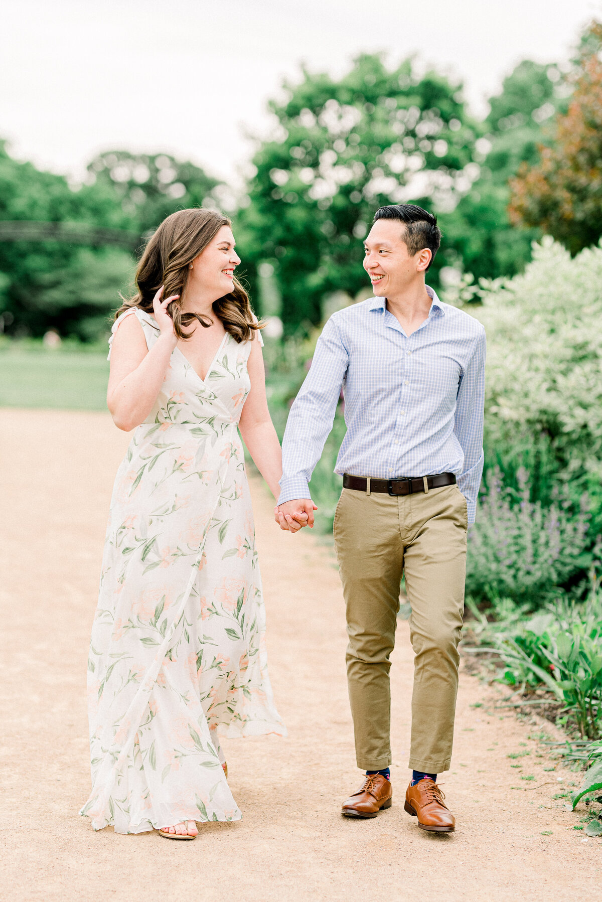 Couple walking down gravel path