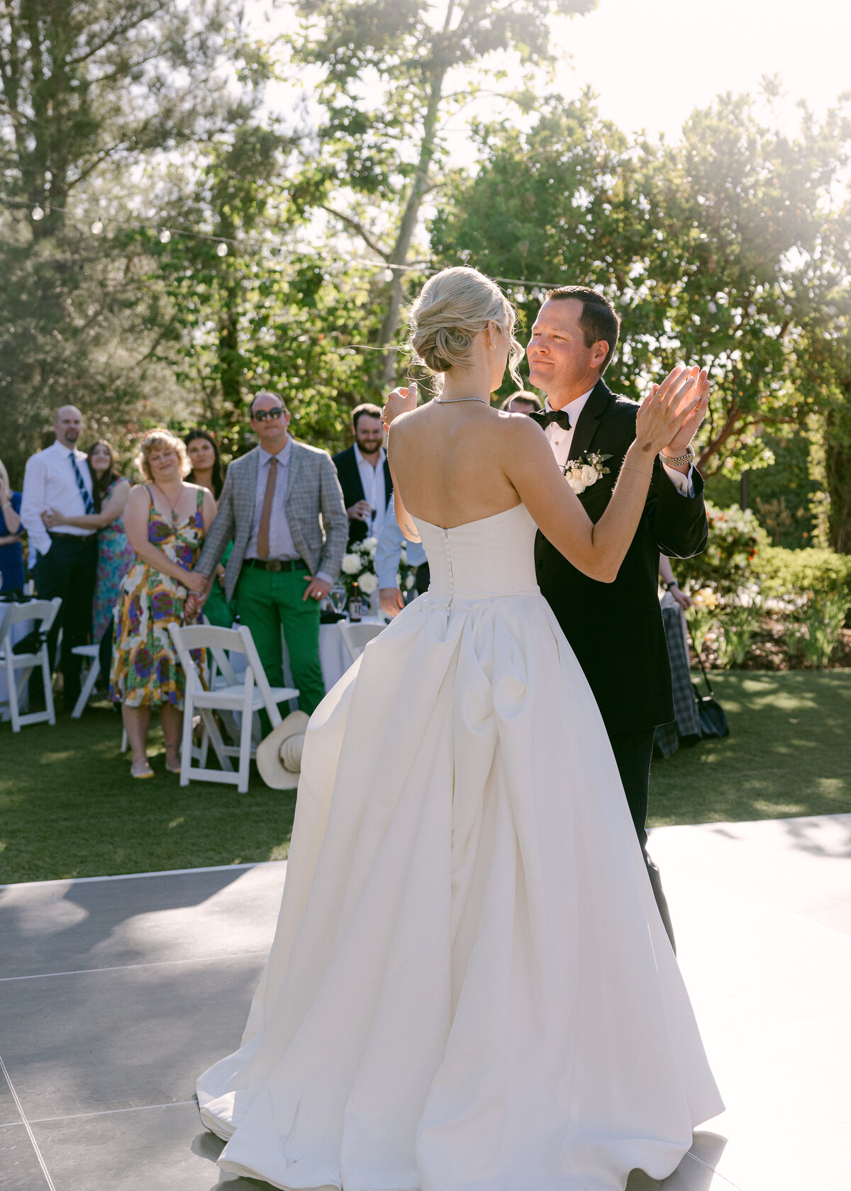 Bride and groom share first dance during their wedding reception in Scottsdale, Arizona.