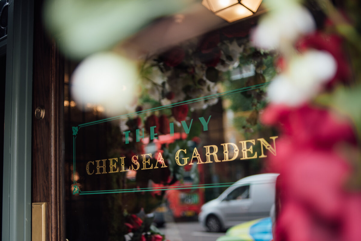 A sign for The Ivy Chelsea Garden taken by London Wedding Photographer Liberty Pearl