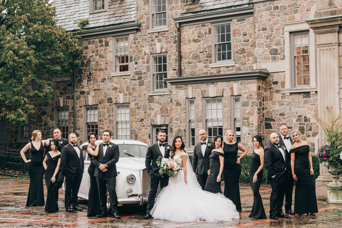 Luxurious wedding party portraits with Rolls Royce