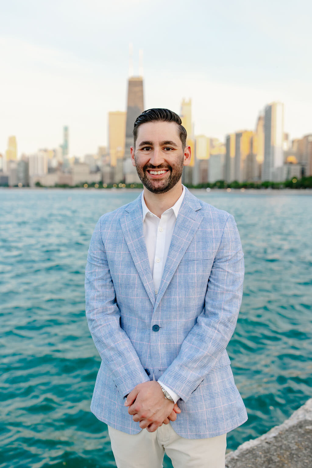 An engagement photography session at The Wrigley Building and North Ave Beach in Chicago, Illinois - 36