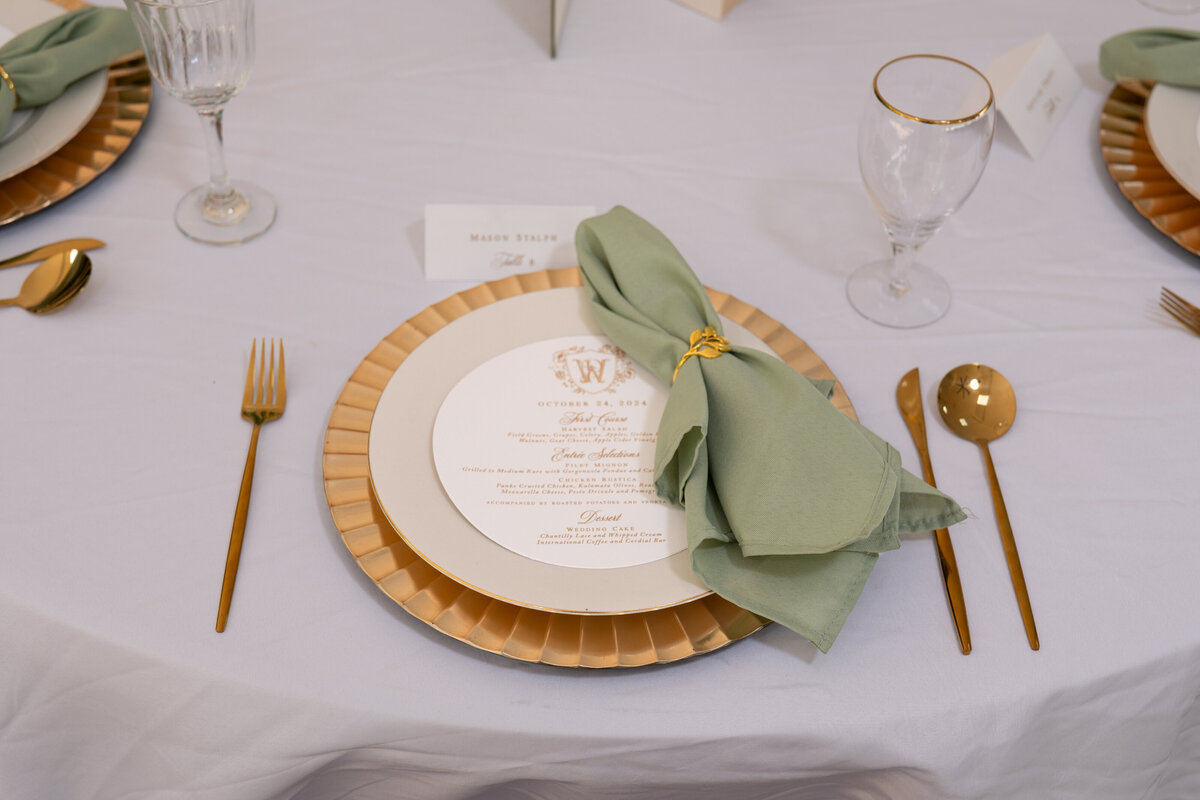 A table with an intricate place setting on it 