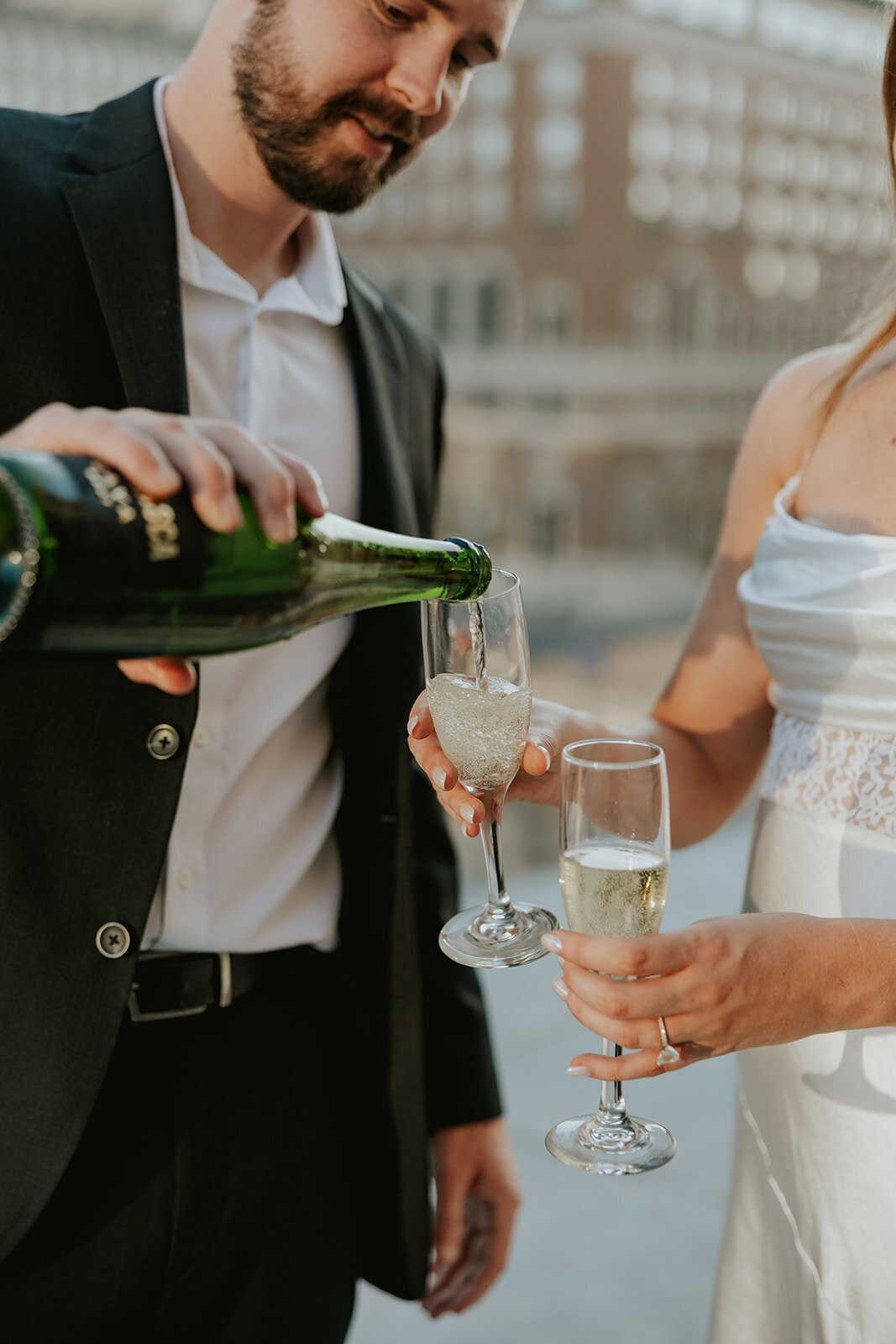 Indianapolis engagement photo champagne celebration idea
