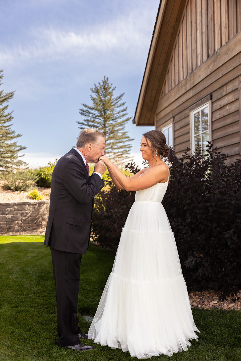 Bride shares a first look with her father on her wedding day.
