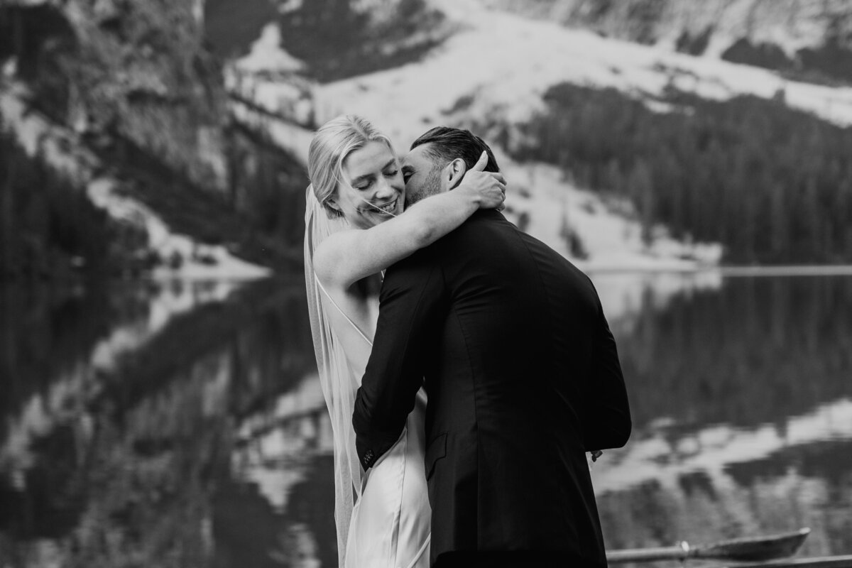 Bride and groom hugging during intimate elopement moment