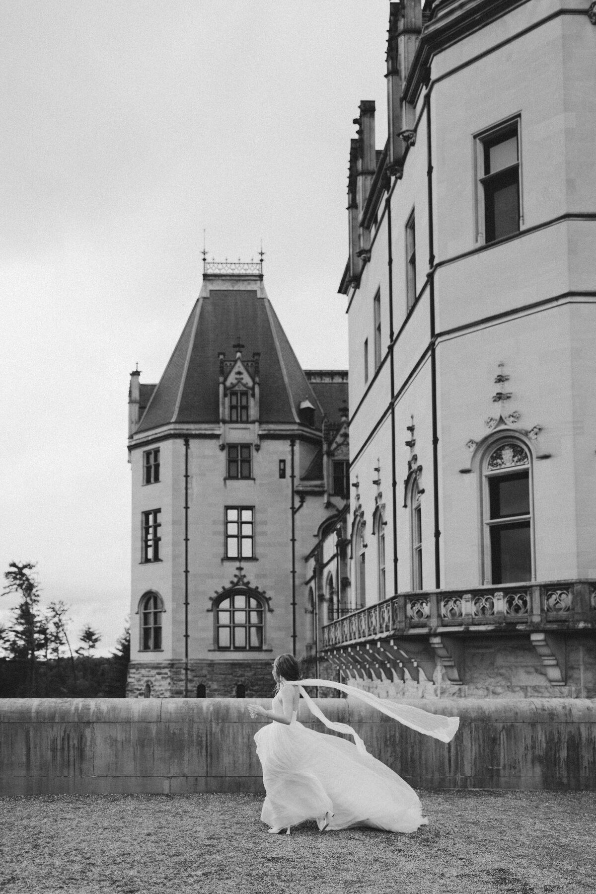 Elegant southern bride in a vintage-inspired Anthropologie gown photographed at the iconic estate.