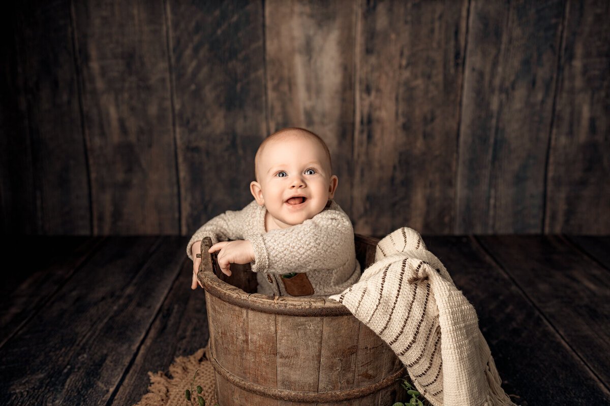 Baby boy sitting in bucket six month pictures by for the love of photography ann arbor