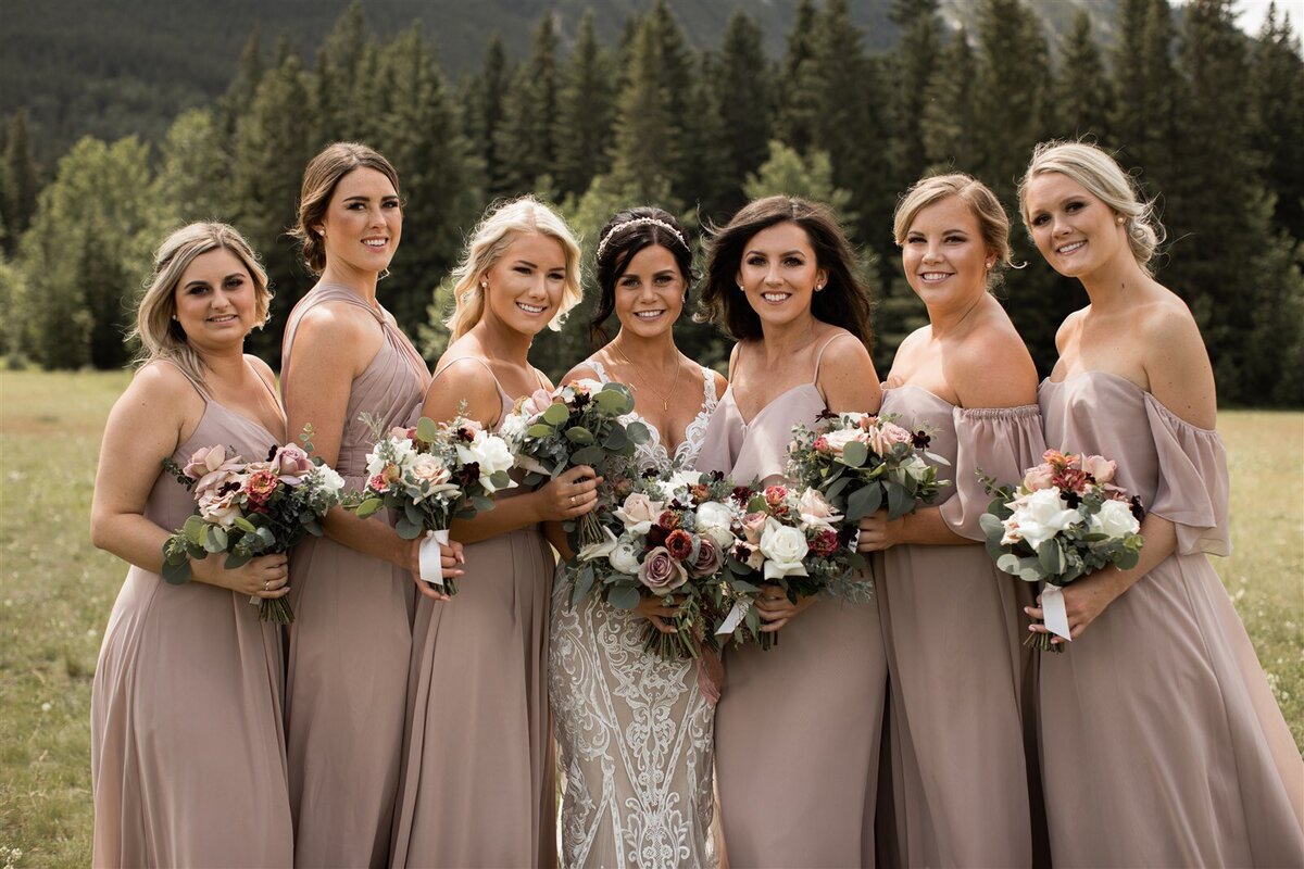 Bridal party with stunning bouquets by Foxglove Studio, contemporary Calgary, Alberta wedding florist, featured on the Brontë Bride Vendor Guide.