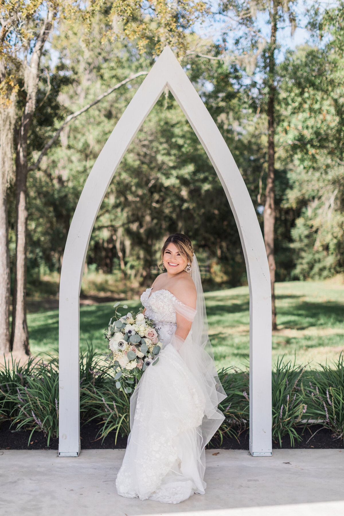 A bride in the outdoor chapel at The Springs Wallisville