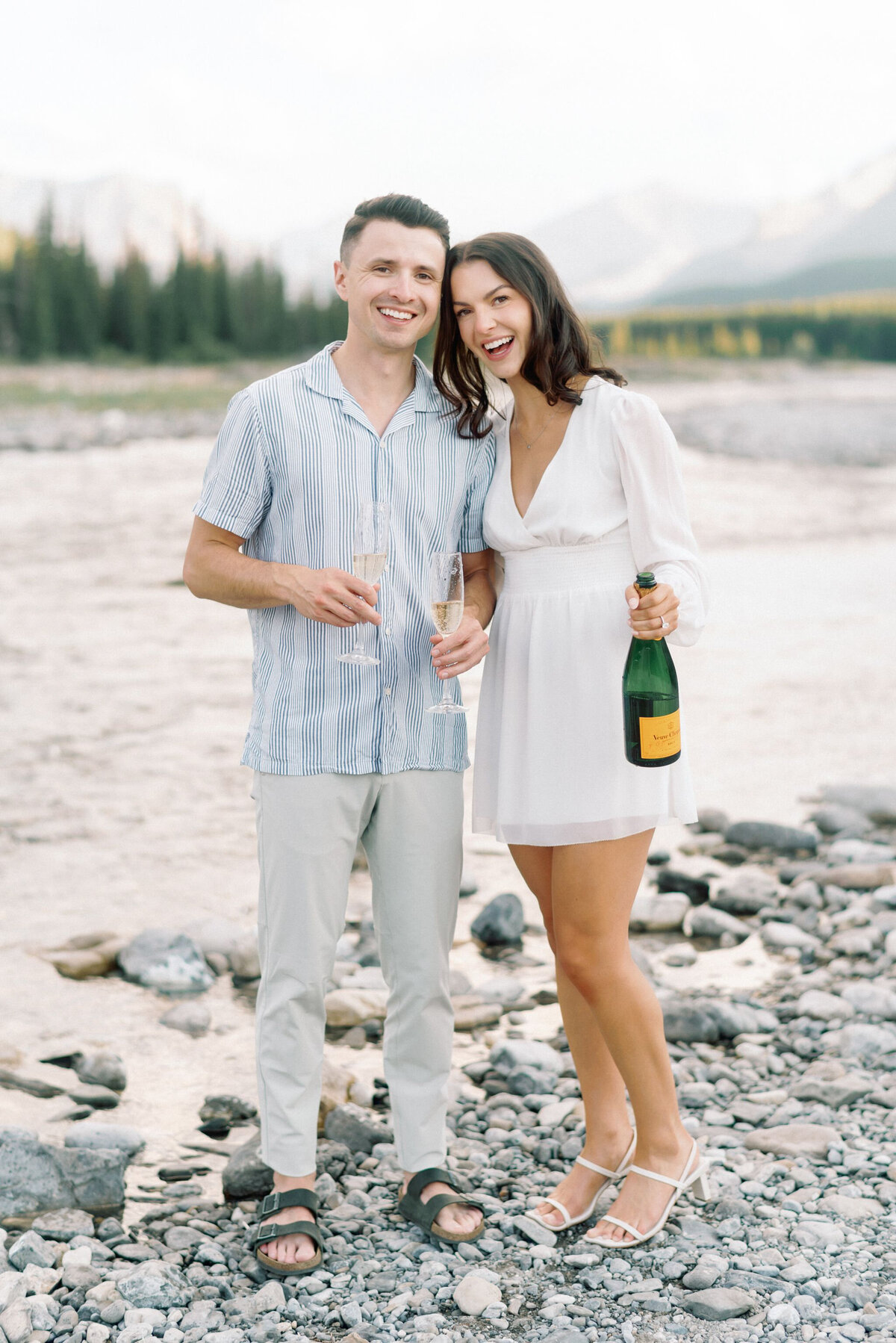 Engaged couple captured by Kaity Body Photography, elegant film inspired wedding photographer in Calgary, Alberta. Featured on the Bronte Bride Vendor Guide.