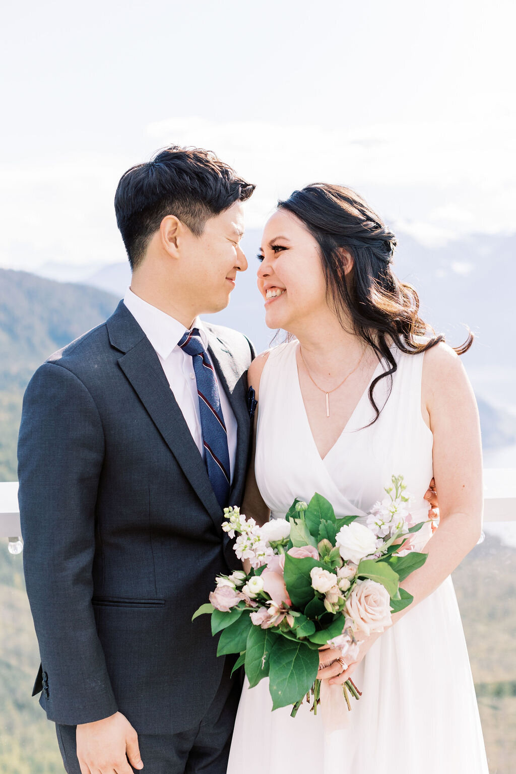 Bride and groom at Sea to Sky Gondola Squamish wedding - Within the Flowers