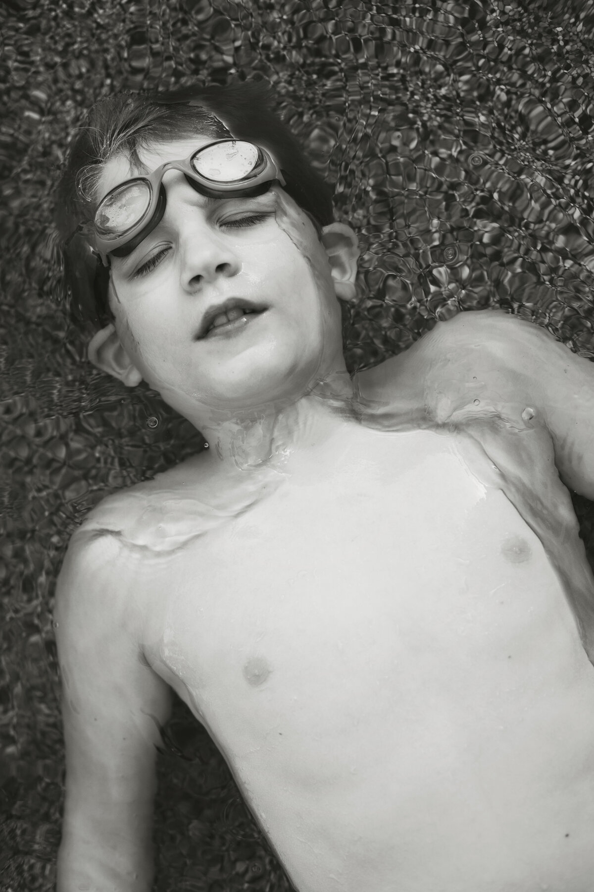 a boy plays in the water in Lewisville texas