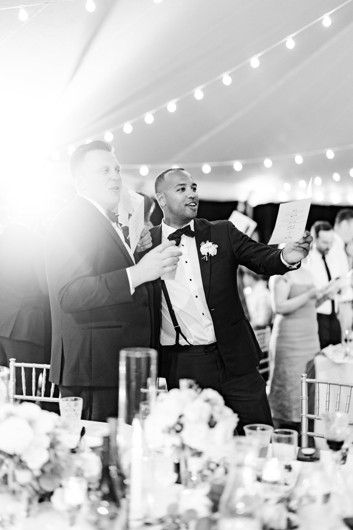 40_groomsmen_singing_at_reception