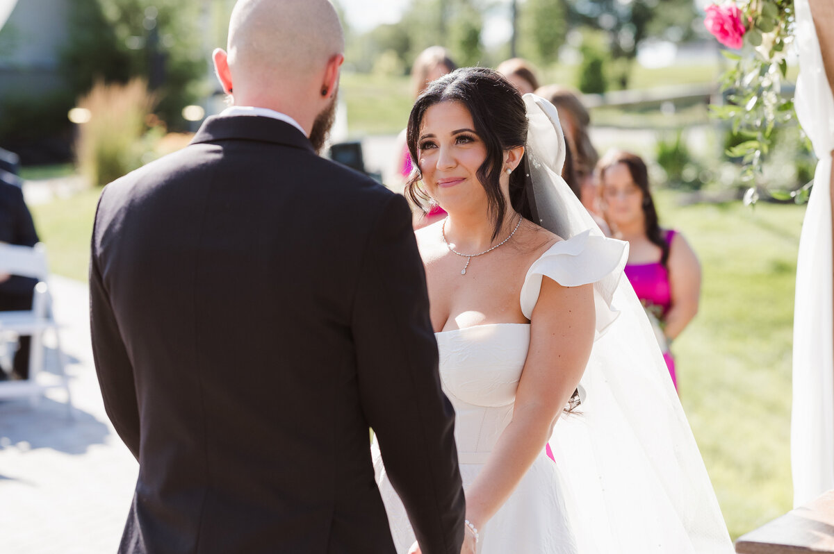 outdoor wedding ceremony with hot pink elegant theme at bear brook valley NJ photo