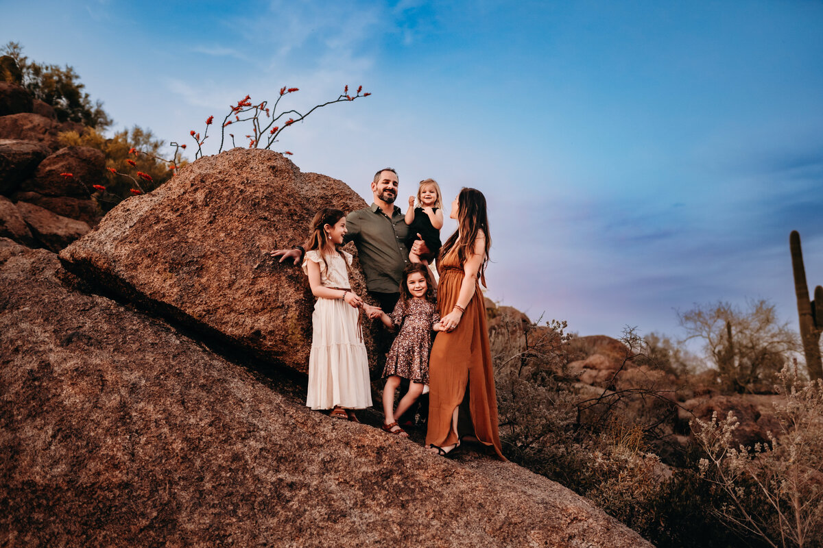 Family standing on rocks in Pennsylvania