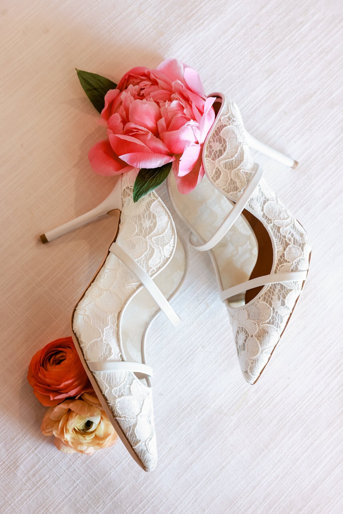high heels covered in white lace