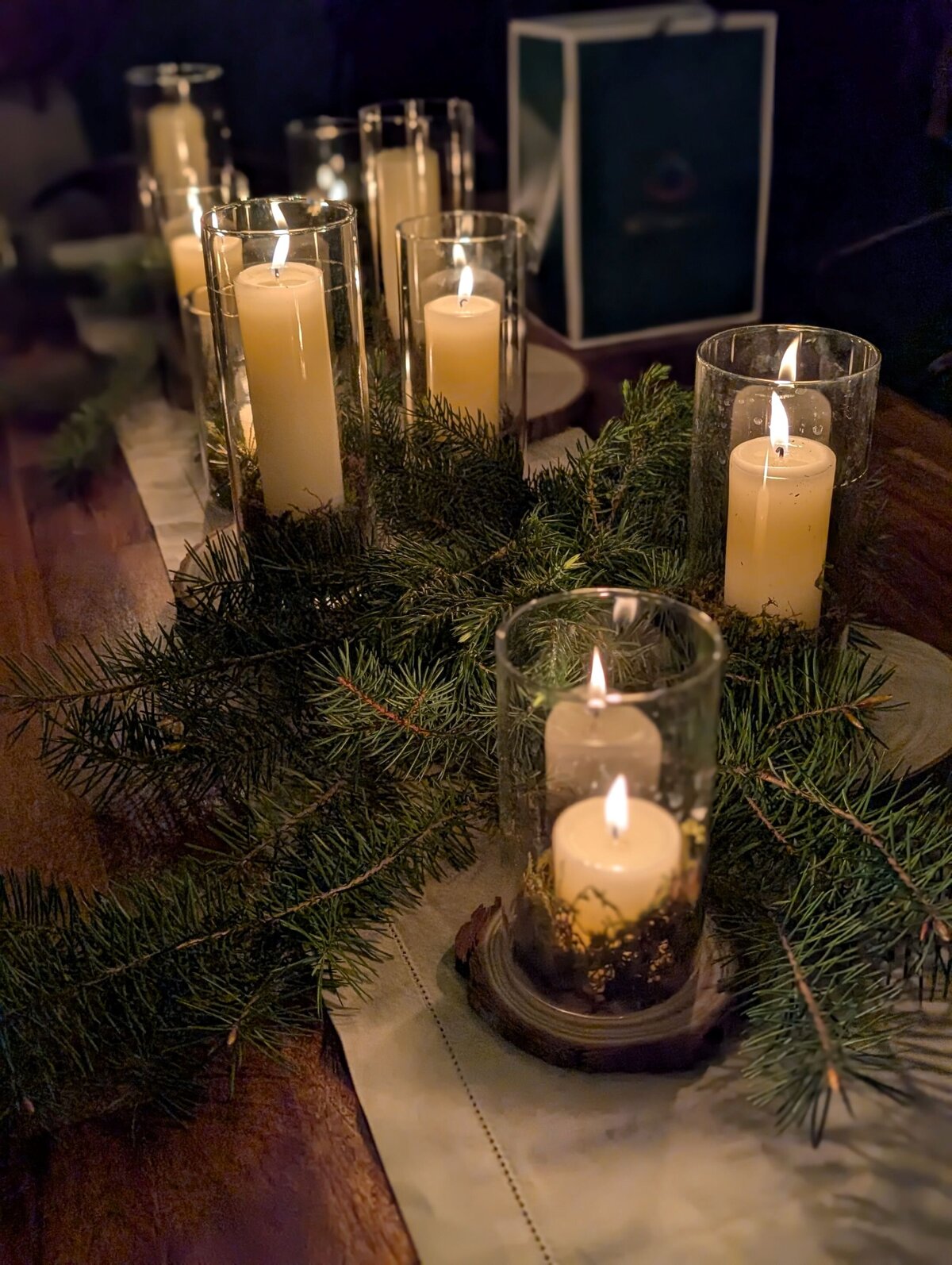 table candles and greens