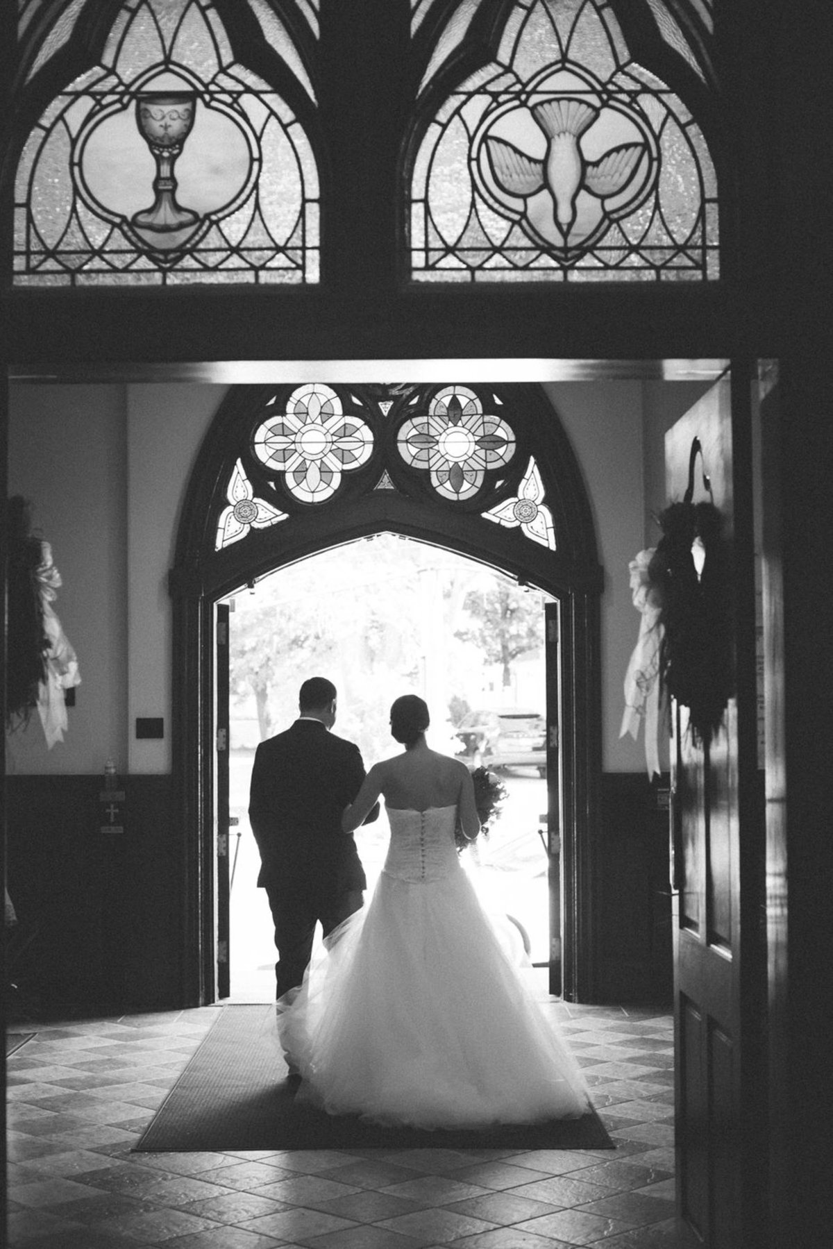 bride and groom exiting the church