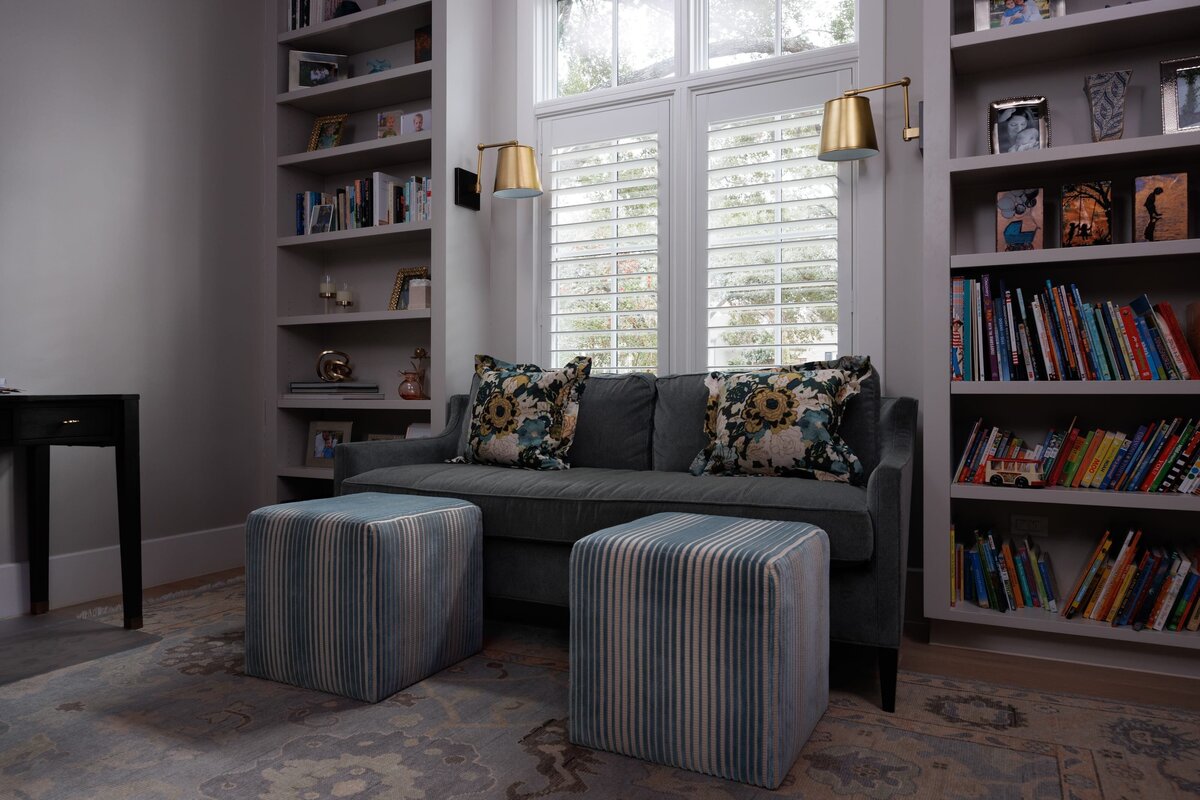 the keeping room interiors primera office couch with bookshelfs