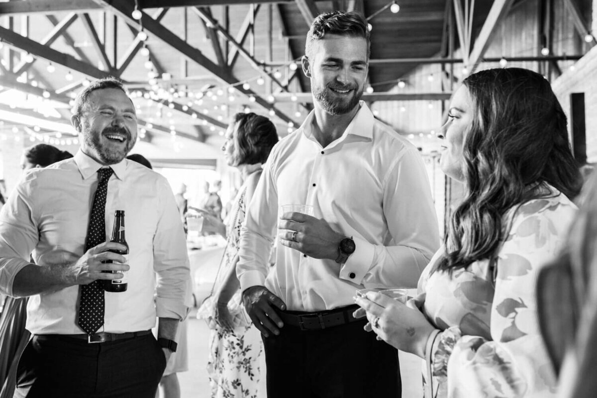 guests-laughing-and-mingling-during-reception