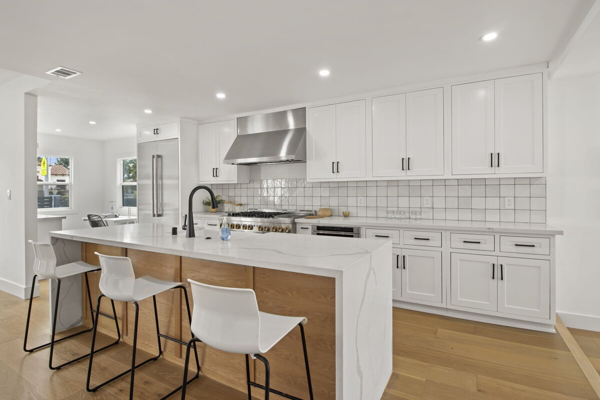 white-modern-kitchen-waterfall-island-aw-development