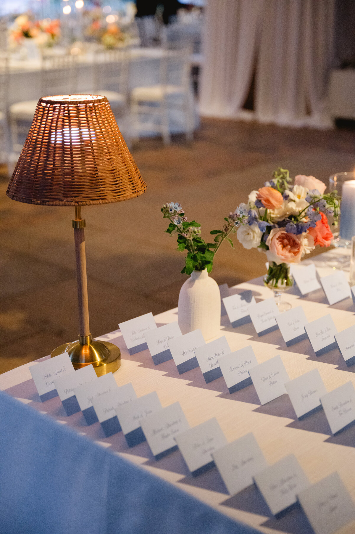Close up of a lamp and wedding place cards