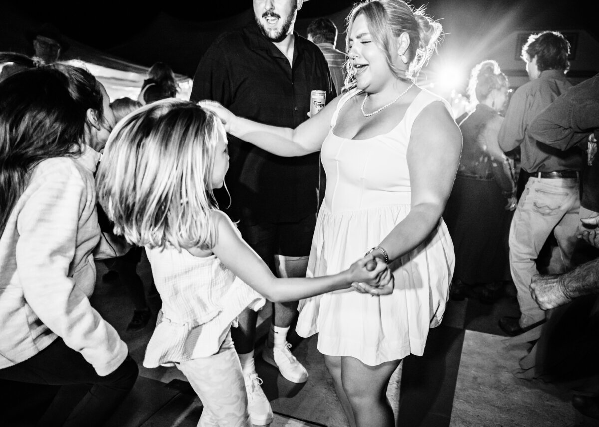 Guests dancing at wedding reception at private home wedding in Choteau, MT
