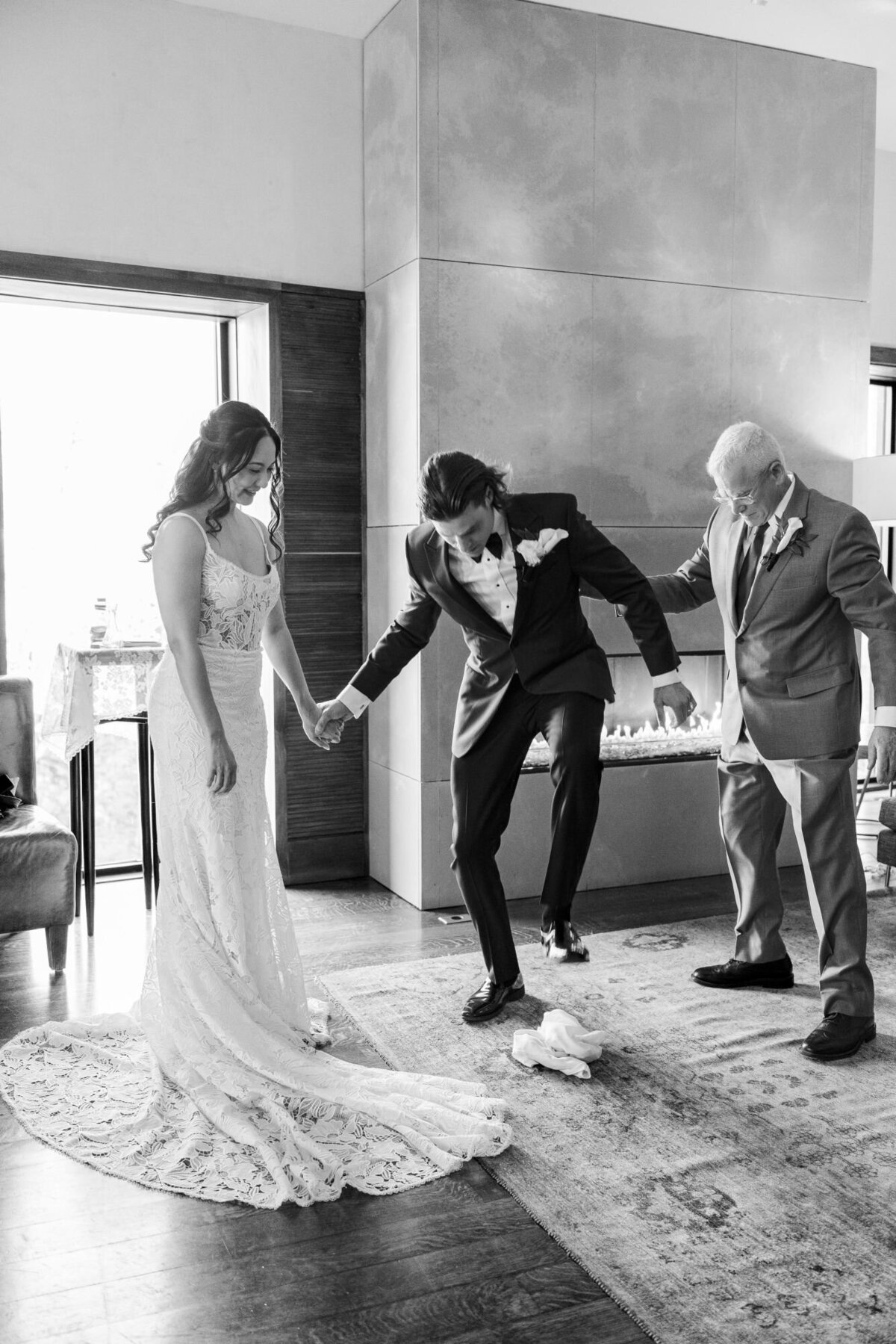 Micro wedding ceremony at The Roundhouse in the Lounge with the groom stomping on the glass