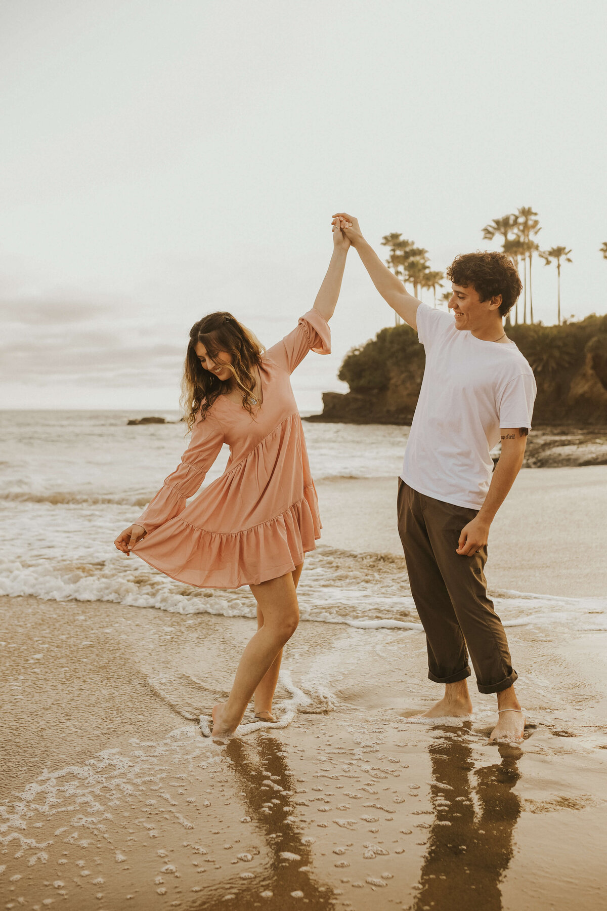 dancing-in-the-ocean-couple-laguna-beach-session
