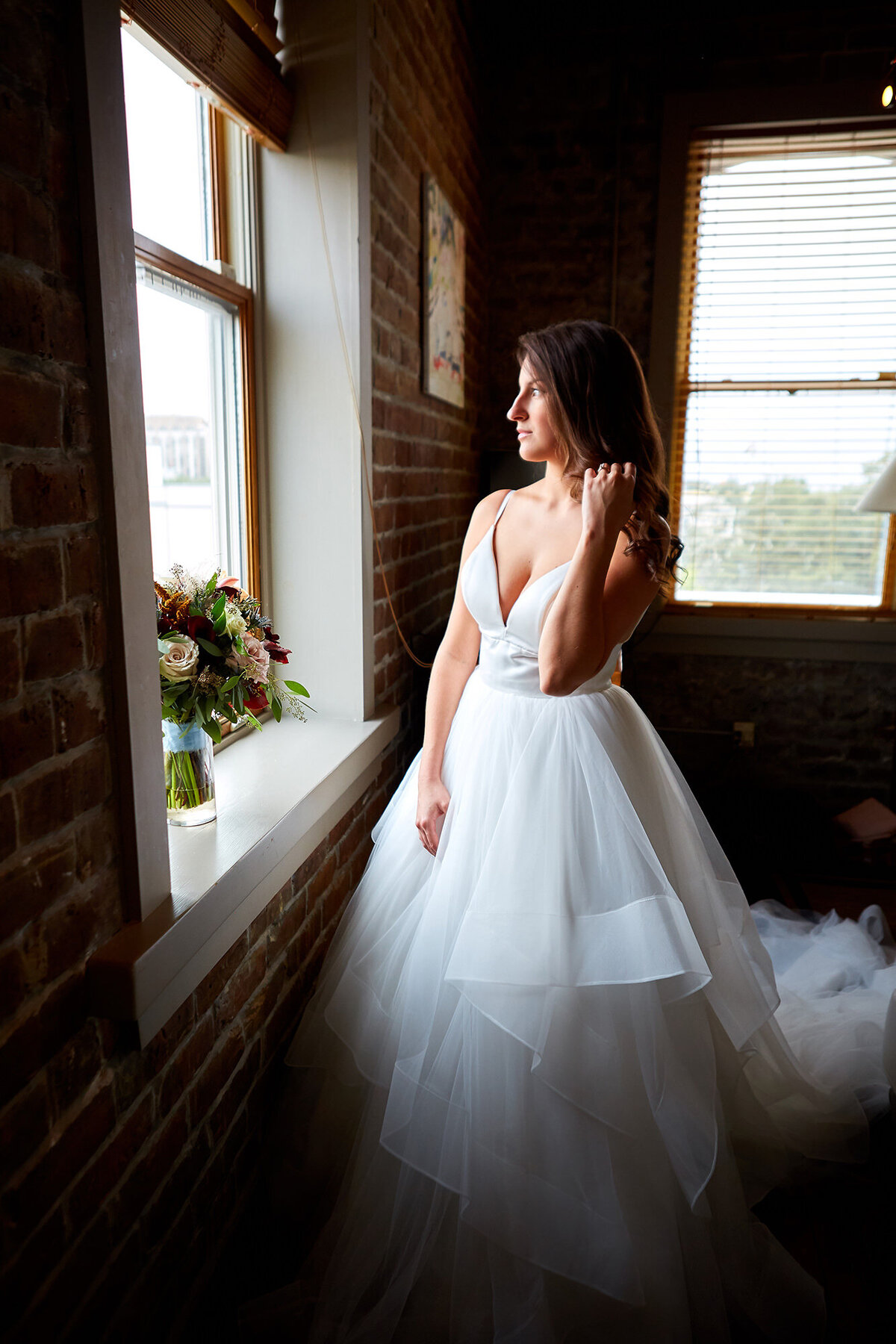 Bride getting ready in downtown Savannah Charleston Wedding Photographer