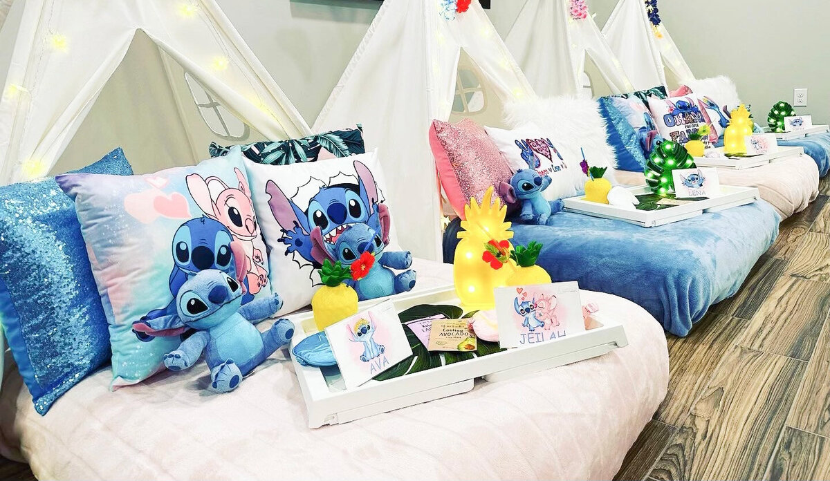 teepee beds with stitch pillows stuffed animals and props