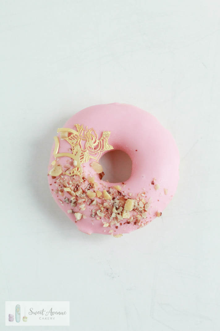 pink and gold lace decorated donut