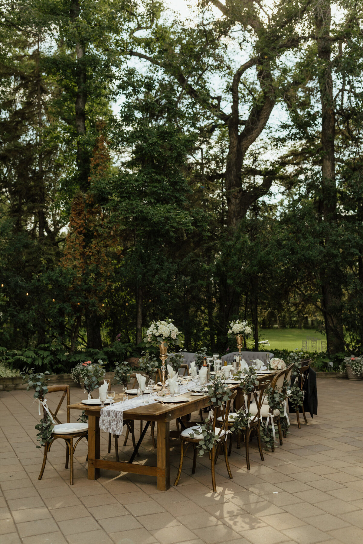 Outdoor intimate reception at The Norland Historic Estate, a classic vintage wedding venue in Lethbridge, AB, featured on the Brontë Bride Vendor Guide.