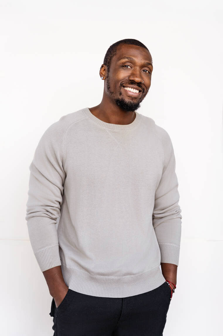 portrait of a baltimore dj posing for a personal branding photoshoot
