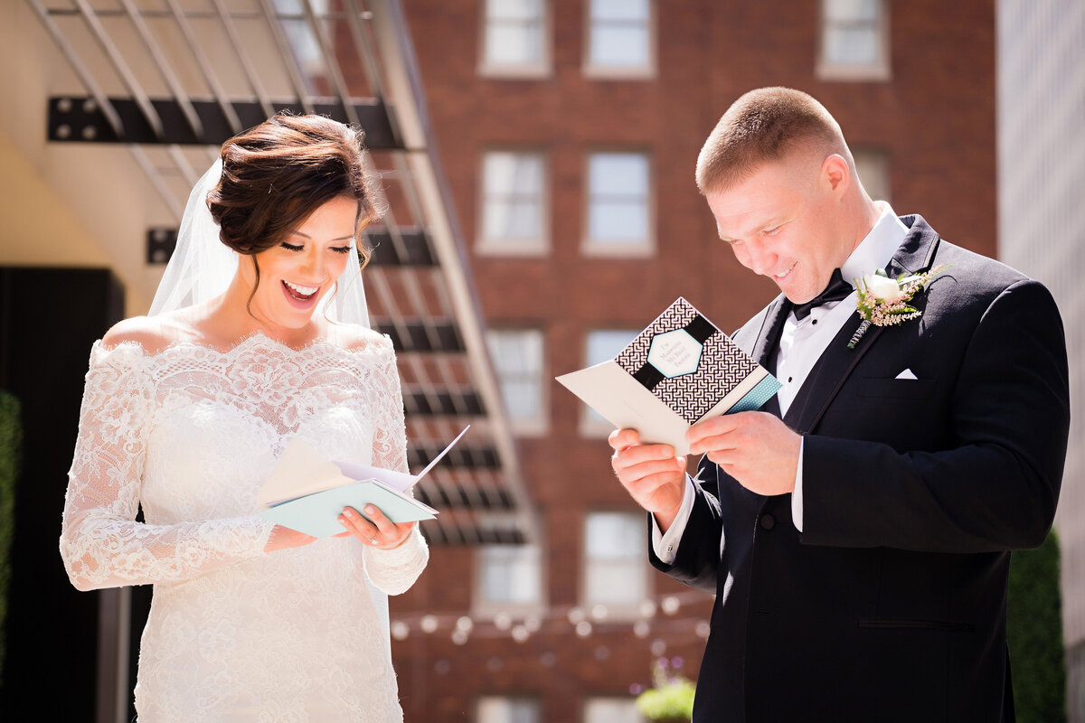 bride and groom reading vows during elopement