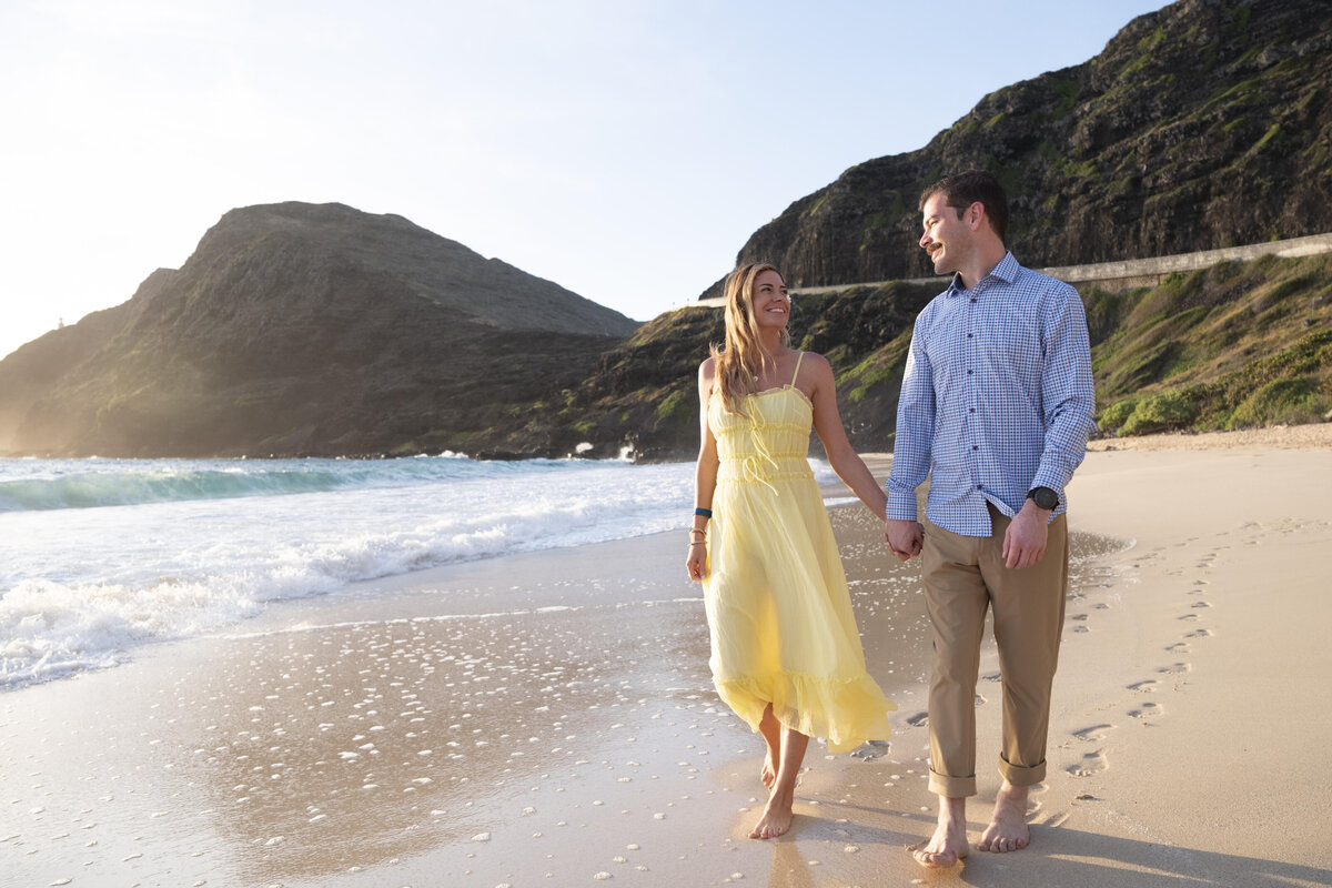 Vinnie and Cait walking on the beach