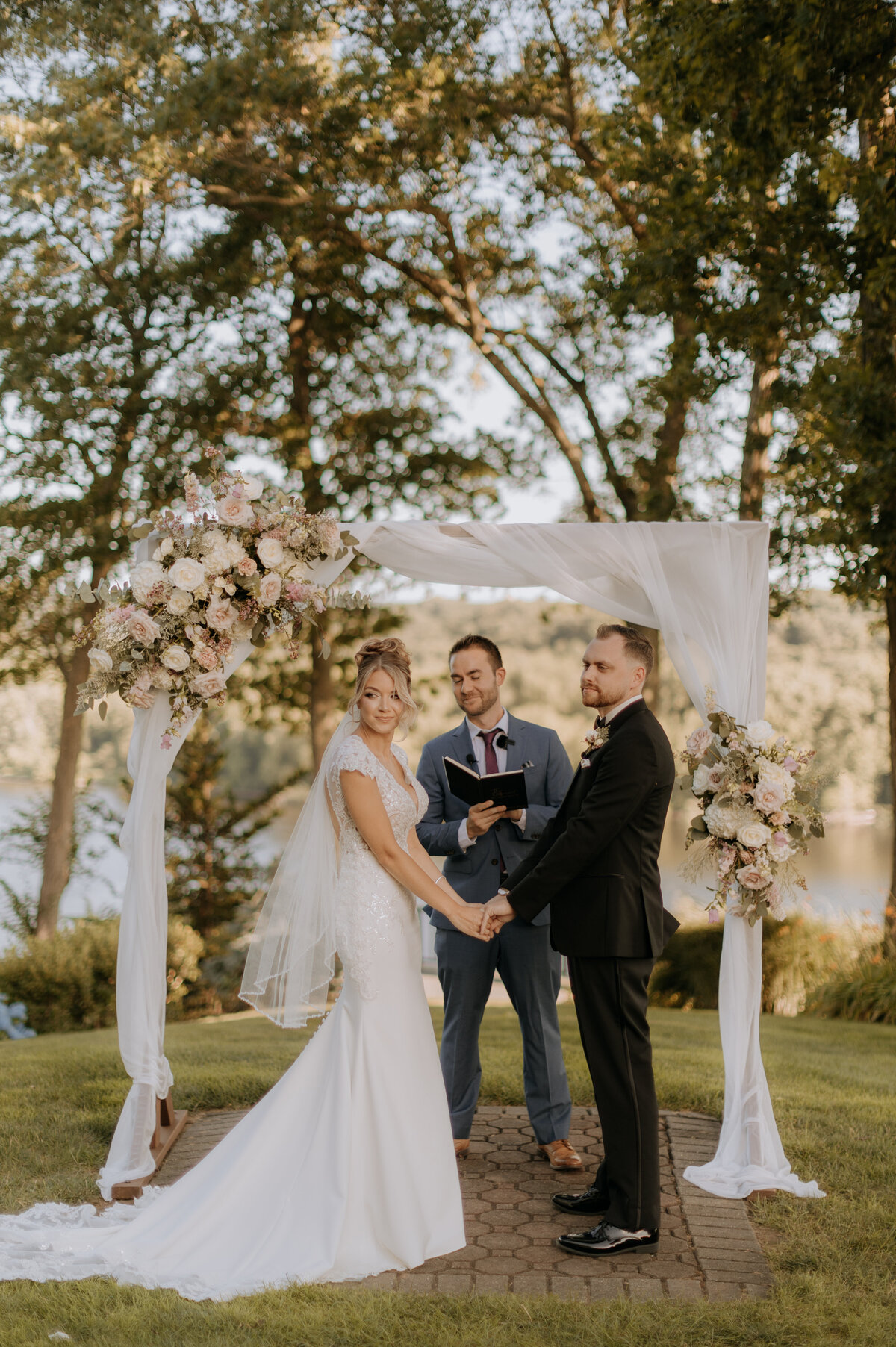 bride-and-groom-at-alter-saint-clements-castle
