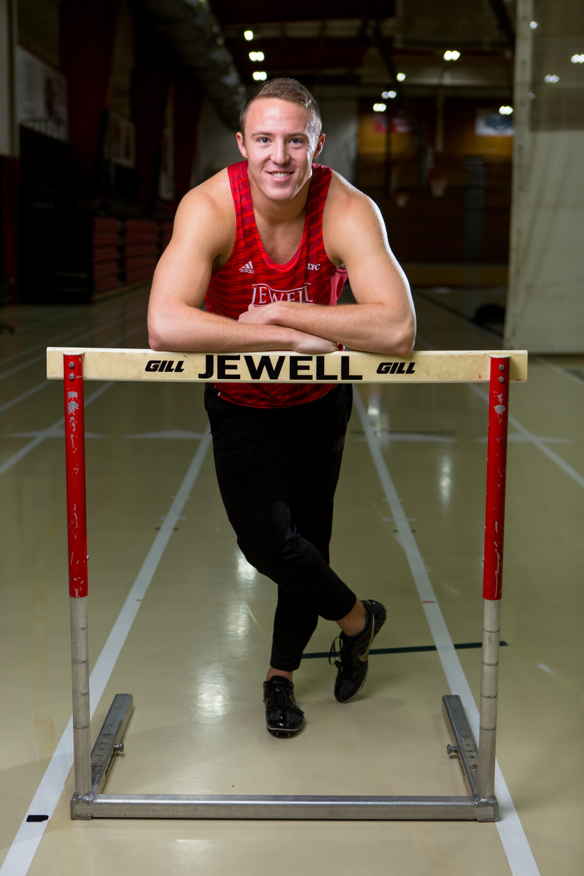 kansas-city-sports-photography-0304-athlete-leaning-on-hurdles