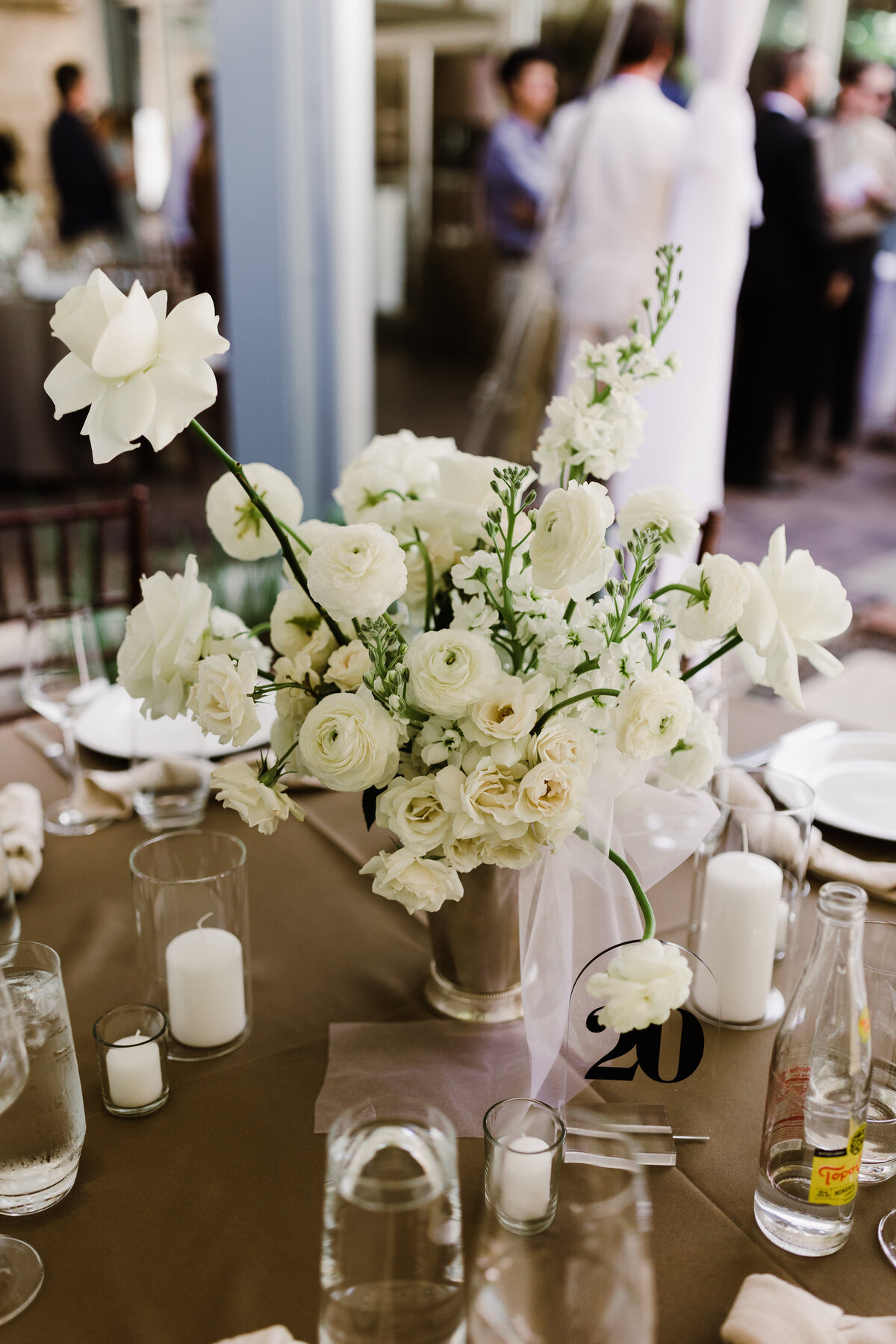 Wedding table decor including florals, candles and glasses at Umlauf Sculpture Garden Wedding, Austin