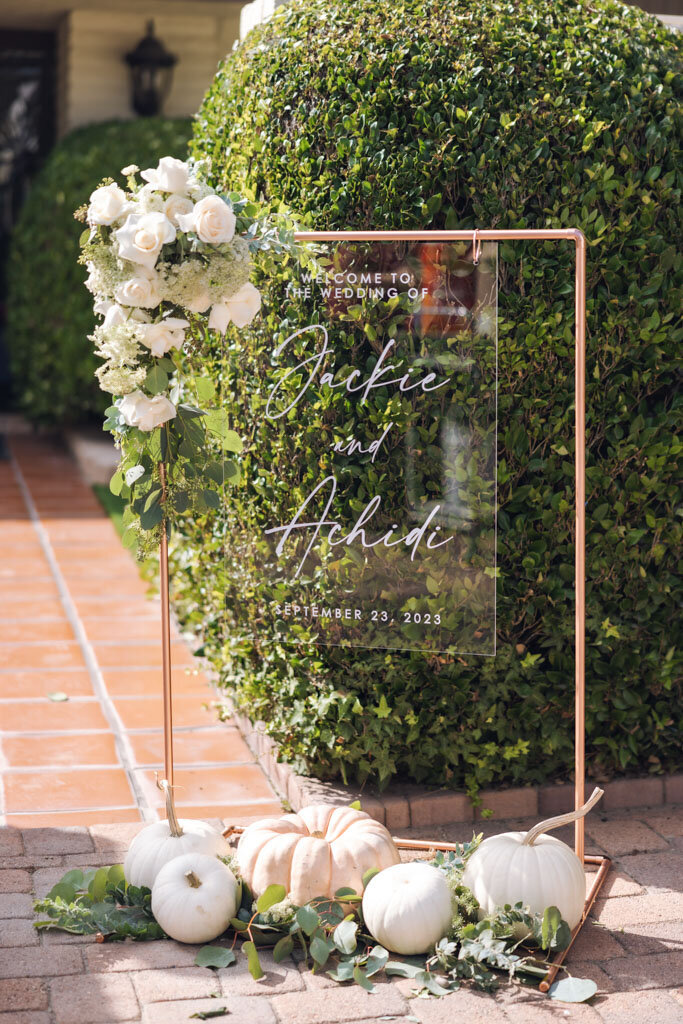 Acrylic Welcome Sign at Backyard Wedding