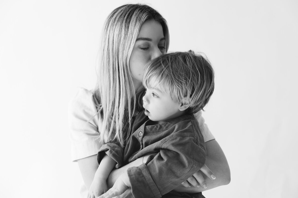 Mother and son during a studio photoshoot.