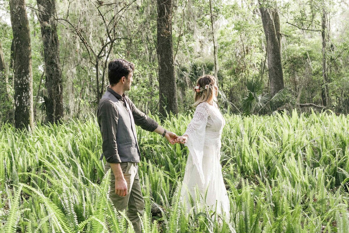 48-bride-leads-groom-into-ferns