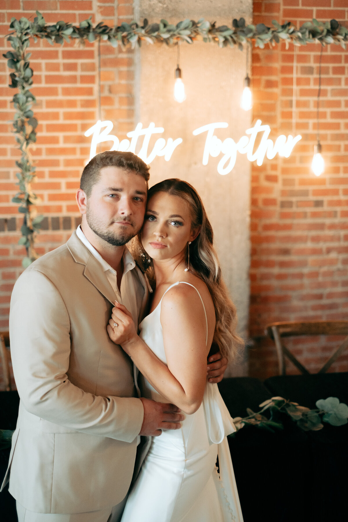 Bride and Groom Portrait in front of Better Together Neon Sign | The Axmanns