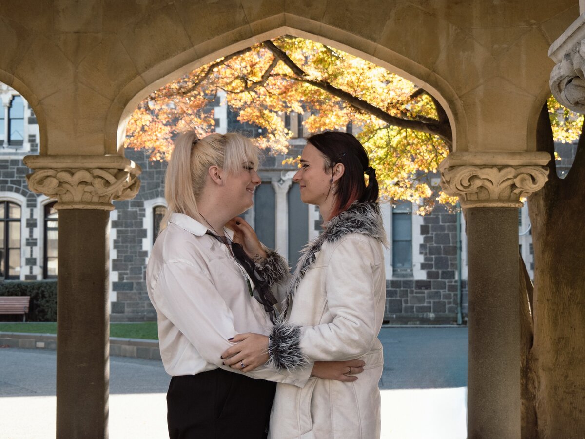 autumn-queer-engagement-photos-christchurch-arts-center-photos-with-river-2
